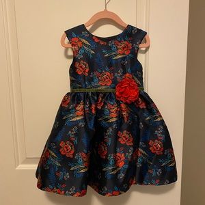 Beautiful holiday dress by Pippa & Julie. Lightly used. Crinoline underneath.